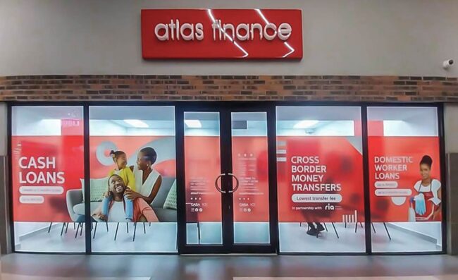 Storefront and entrance of Atlas Finance's Bizana branch, offering fast easy loans.