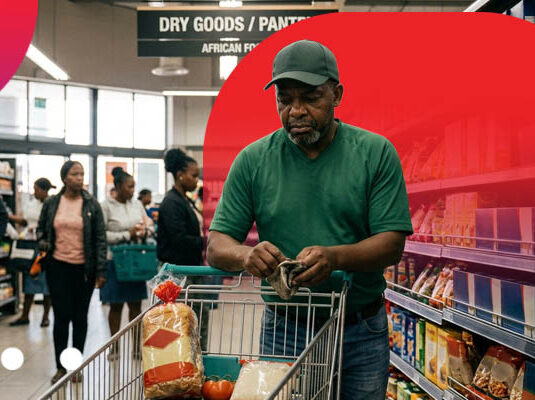 Man shopping for groceries amidst the rising South Africa Food Inflation Rate.